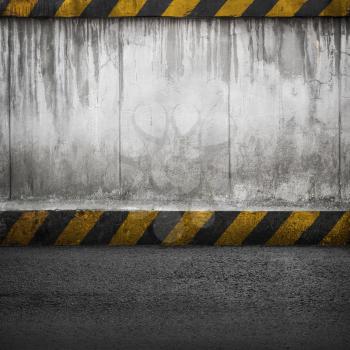 Concrete wall and asphalt. Abstract industrial interior background texture