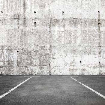 Abstract empty parking interior background with road marking and white concrete wall