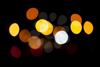Abstract photo background with colorful lights bokeh on black