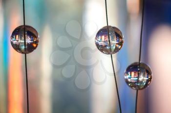 Abstract background with glass spherical design elements of modern chandelier