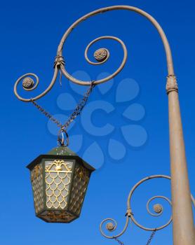 Vintage street lantern on the bridge in Saint-Petersburg, Russia.