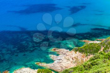 Coastal rocks of Corsica island, French mountainous Mediterranean island