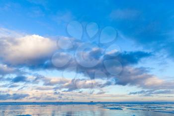 Winter Sea coastal landscape with cloudy sky. Gulf of Finland, Russia
