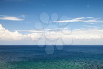 Seascape with blue water and cloudy sky, Mediterranean sea