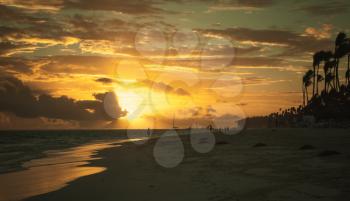 Sunrise over Atlantic ocean coast. Hispaniola island, Dominican republic, Punta Cana beach. Vintage style, tonal correction photo filter effect