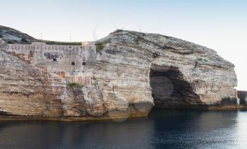 Bay of Bonifacio, coastal rocks with grotto. Mountainous Mediterranean island Corsica, Corse-du-Sud, France