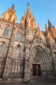 Cathedral of the Holy Cross and Saint Eulalia also known as Barcelona Cathedral. Facade fragment, vertical photo