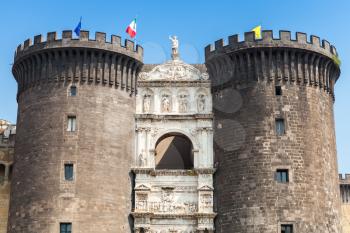 Castel Nouvo. Main facade of medieval castle in Naples, Italy. It was first erected in 1279, now it is one of the main architectural landmarks of the city