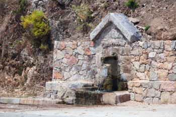 Clear drinking water source. South Corsica, France, Piana region