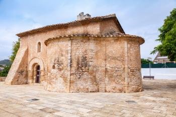 Saint Michael church in Calafell, Spain. It is a work of transaction from Romanic to Gothic style, was shaped in XIII century, has two apses, one consecrated to St. Miahael, another to St. Mary