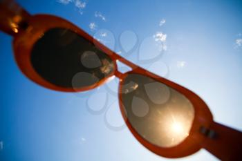 Sun is shining through modern sunglasses