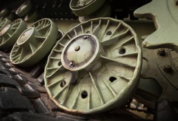Heavy industry photo background with dark green tractor gears