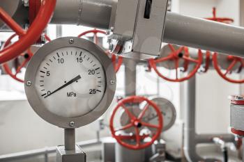 Valves and manometers on Industrial pipeline system