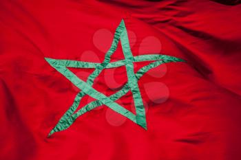 National flag of Morocco. Green star on red background