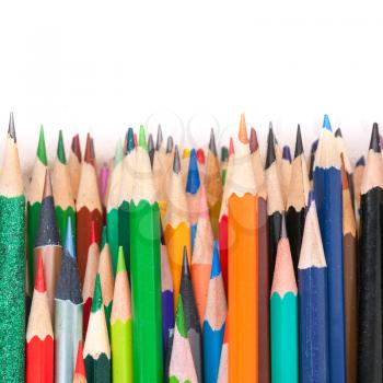 Sharp colorful pencils. Macro photo background on white background
