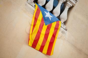 Flag of independent Catalonia hanging on the wall