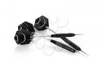 Set of three dart arrows lay isolated on white background with soft shadow