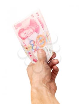 Chinese 100 yuan renminbi banknotes in male hand isolated on white  background, vertical photo