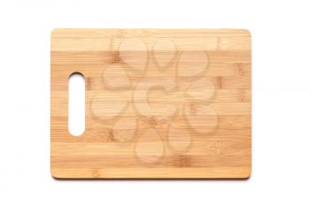 New cutting board made of bamboo planks on white table background with shadow