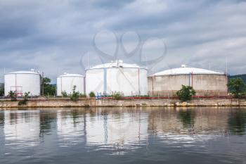 Oil storage area with white tanks on Black sea coast in Varna port, Bulgaria