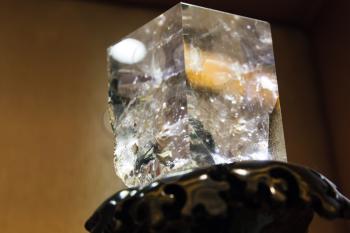 Closeup photo of natural transparent quartz crystal in cube shape
