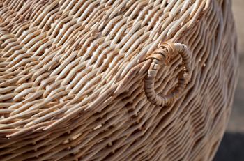 Wicker basket close-up photo with shallow depth of field