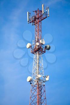 Mobile phone communication tower with devices