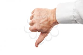 Closeup photo of business man hand showing thumbs down no sign isolated on white background