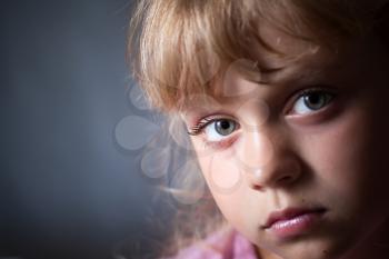 Closeup portrait of a little blond beautiful small Russian girl. Photo with Shallow Depth of Field