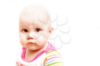 Little sad brown eyed baby, studio portrait isolated on white