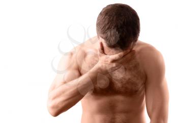Sad muscular young naked man isolated on white background