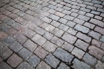 Background texture of old granite cobblestone road