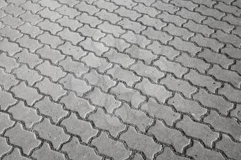 Background texture of gray modern cobblestone road