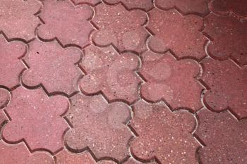Background texture of red modern cobblestone surface