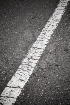 Old white line perspective. Road marking