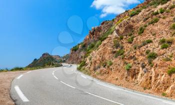 Turning mountain road, landscape of Corsica, France. Porto Vecchio region