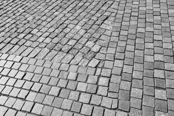 Gray cobblestone pavement pattern, background photo texture