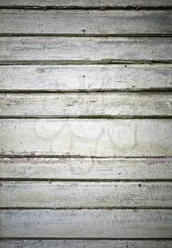 Detailed background texture of old green wall made of wooden lining boards