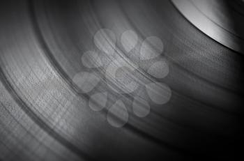 Detailed vinyl LP close up background with shallow depth of field