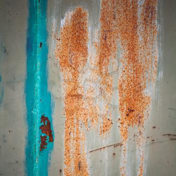 Rusted blue-green painted metal wall background. Detailed photo texture
