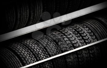 Row of car tires on the counter