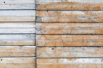 Old rusted corrugated metal wall background texture