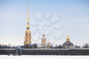 Peter and Paul fortress, one of the most popular landmarks of Saint-Petersburg, Russia. Winter cityscape with ice on Neva river