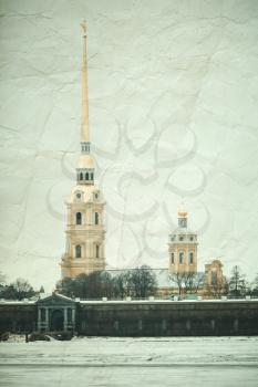 Peter and Paul fortress, one of the most popular landmarks of Saint-Petersburg, Russia. Vintage stylized vertical photo with old paper texture and retro tonal correction filter effect 