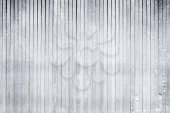 New corrugated metal fence, industrial wall background photo texture