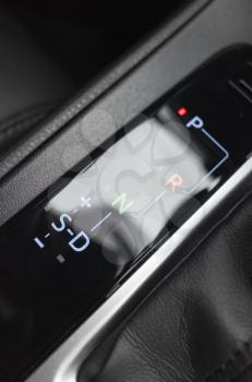 Modern luxury car with automatic transmission, closeup photo of gear selector indicator