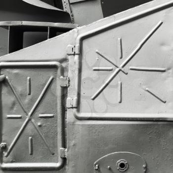 Abstract gray industrial metal background texture with manholes, details of Russian armored train from WWII time
