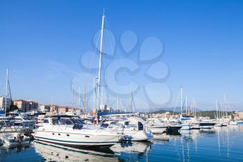 Sailing and motor yachts moored in port of Ajaccio, the capital of Corsica, French island in the Mediterranean Sea