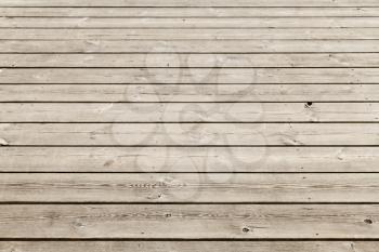 Uncolored old wooden floor. Background photo with selective focus and shallow DOF