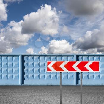 Red and white dangerous turn road sign stands near asphalt road and blue concrete fence under cloudy sky